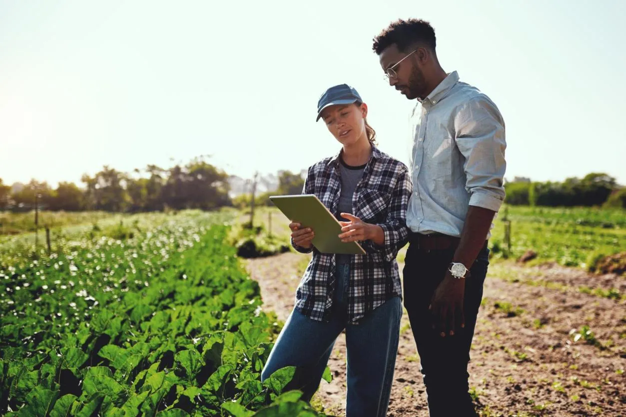 Farmers using technology in the field